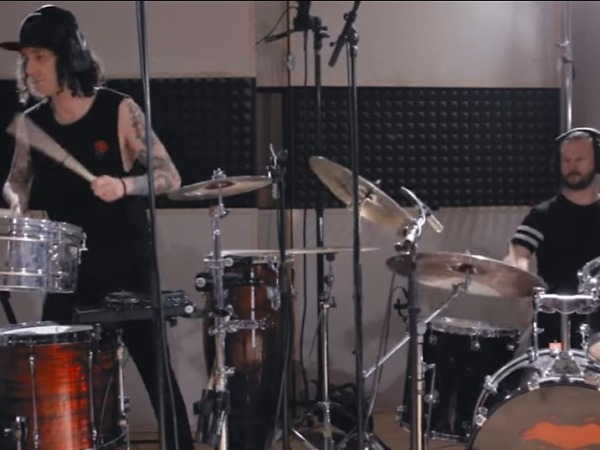 Kill The Kong Dead Spirit live studio recording session, photo showing percussionist and drummer playing in music studio.