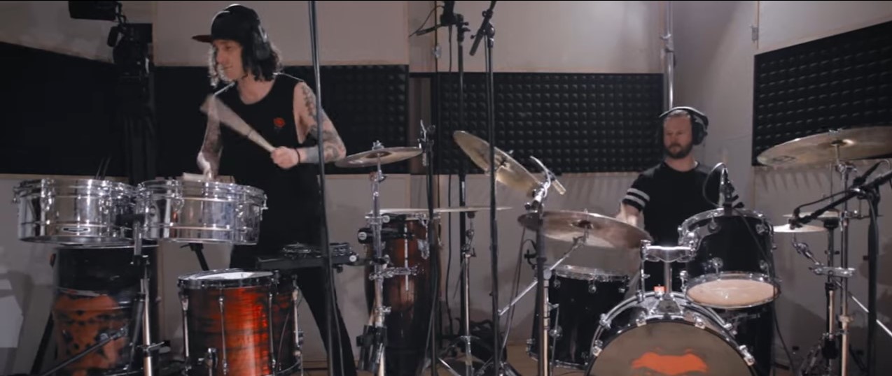 Kill The Kong Dead Spirit live studio recording session, photo showing percussionist and drummer playing in music studio.